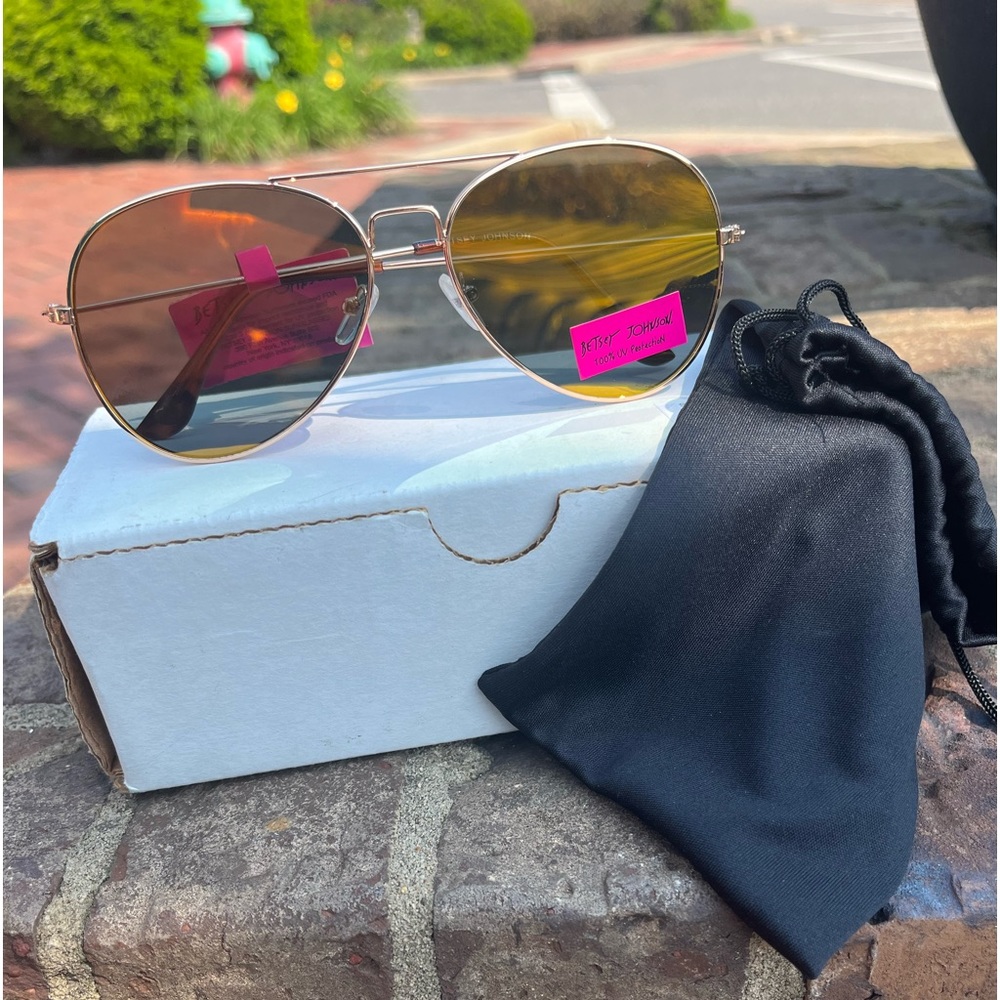New!  Betsey Johnson sunglasses.  100% UV Protection.  Comes with dusk bag.